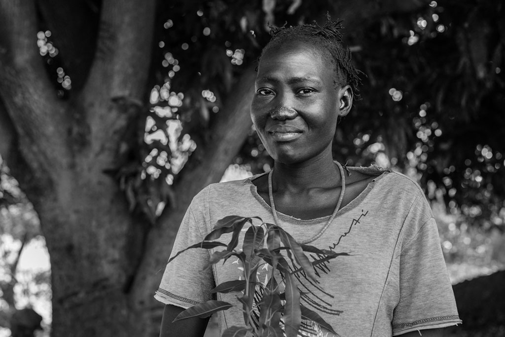 A woman planting trees in Gambella|Juney